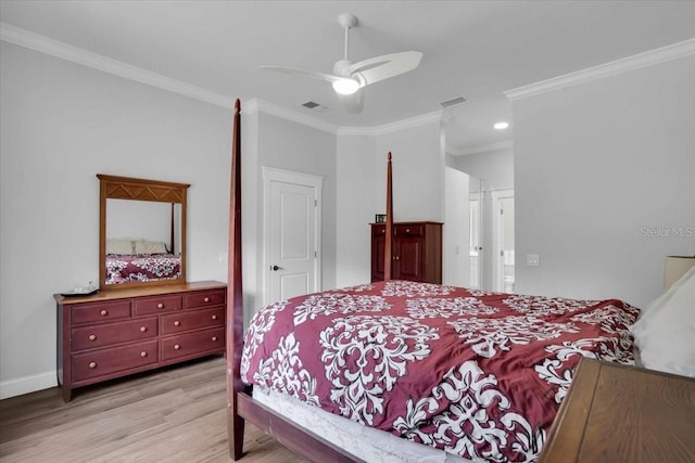 bedroom featuring ceiling fan, crown molding, and light hardwood / wood-style flooring