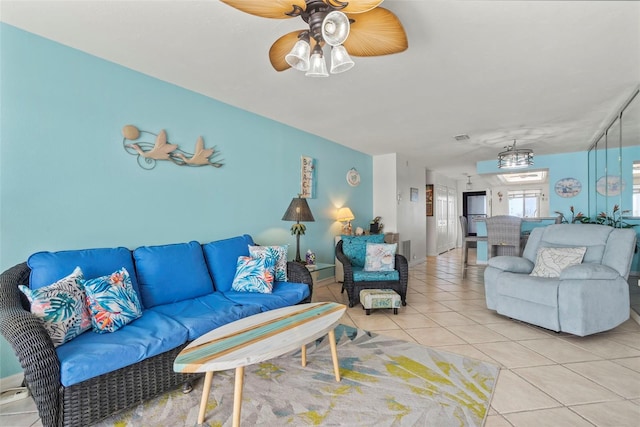 tiled living room featuring ceiling fan