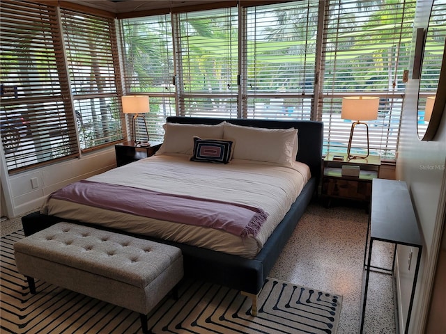 bedroom featuring speckled floor