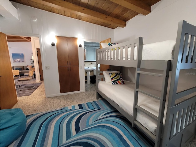 bedroom with wooden ceiling and lofted ceiling with beams