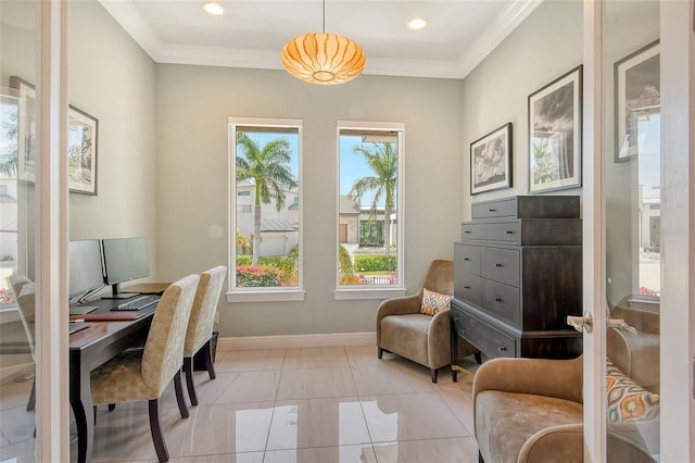 office featuring ornamental molding, a healthy amount of sunlight, and light tile patterned flooring