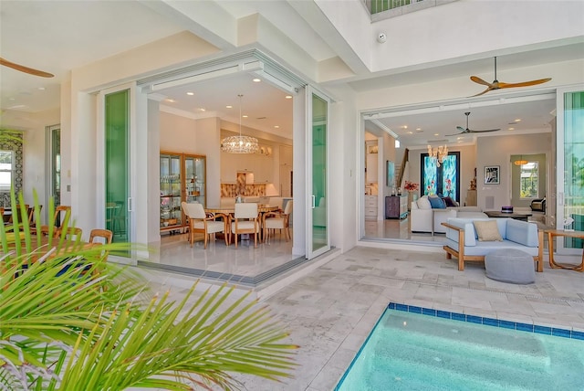 rear view of house with a patio area and an indoor pool