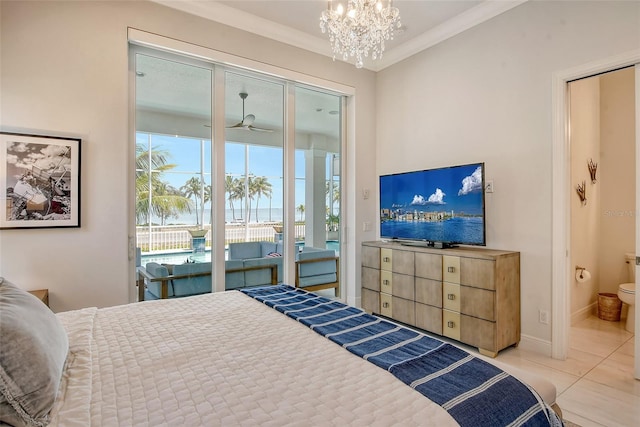 tiled bedroom with access to exterior, ornamental molding, ensuite bath, and a notable chandelier