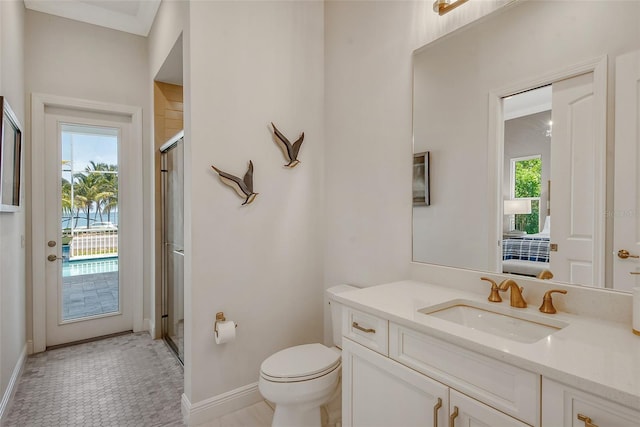 bathroom with walk in shower, toilet, plenty of natural light, and tile patterned flooring