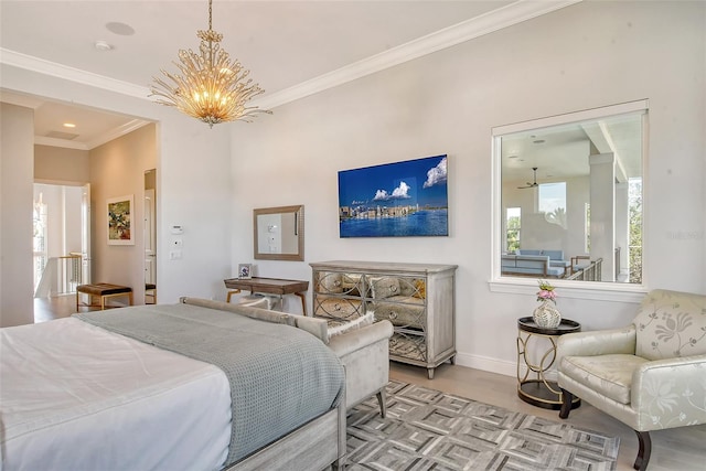 bedroom with an inviting chandelier and crown molding