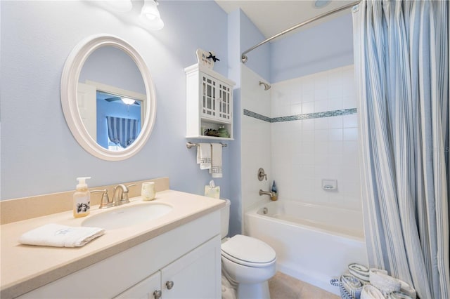 full bathroom with vanity, toilet, and shower / tub combo with curtain