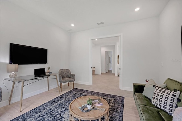 living room with hardwood / wood-style flooring