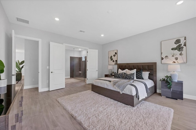 bedroom featuring light hardwood / wood-style floors