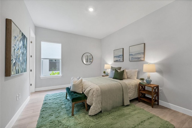 bedroom with light hardwood / wood-style floors