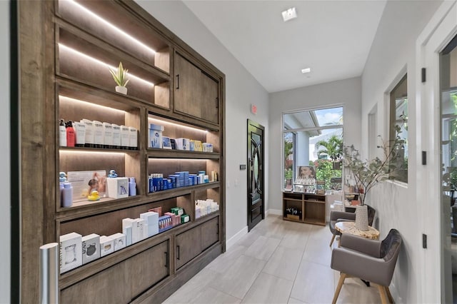 living area with light tile patterned flooring