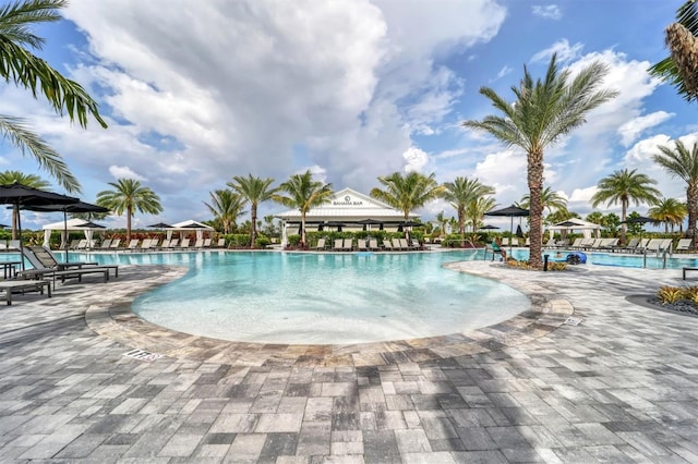 view of swimming pool with a gazebo and a patio