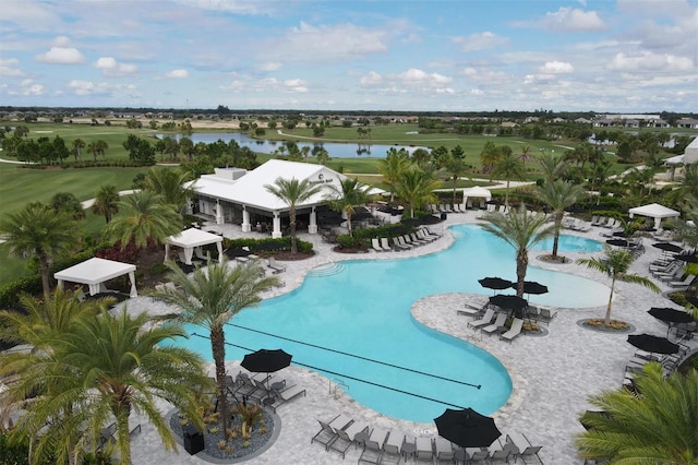 view of swimming pool with a water view