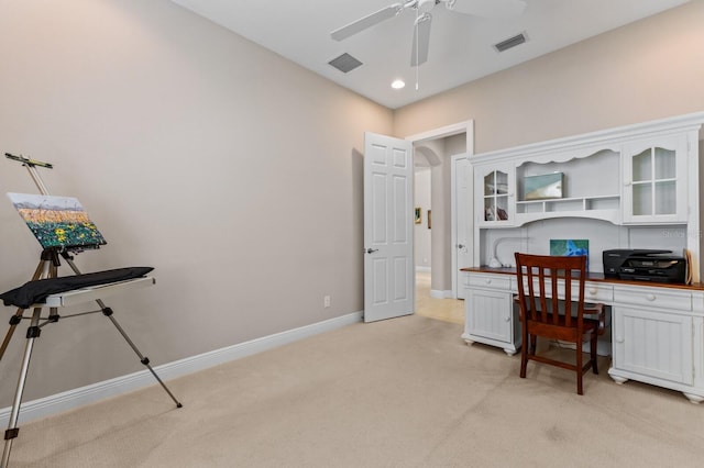 office featuring light carpet and ceiling fan