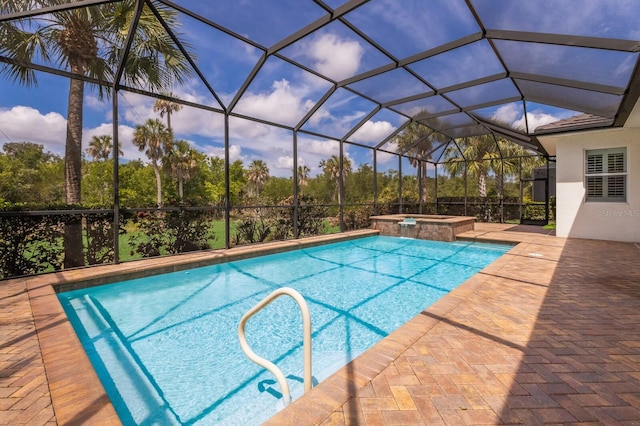 view of swimming pool featuring a lanai, an in ground hot tub, and a patio