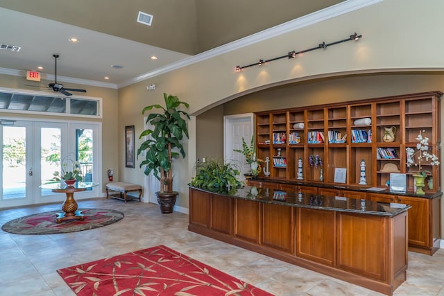 reception with french doors and ceiling fan