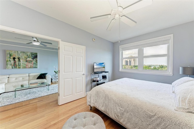 bedroom featuring ceiling fan and hardwood / wood-style floors