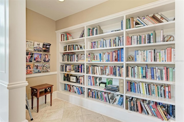 living area with tile patterned flooring