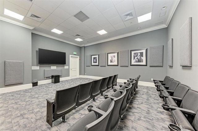 home theater room with a paneled ceiling