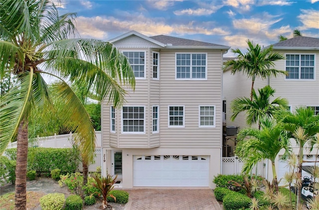 view of front of property with a garage