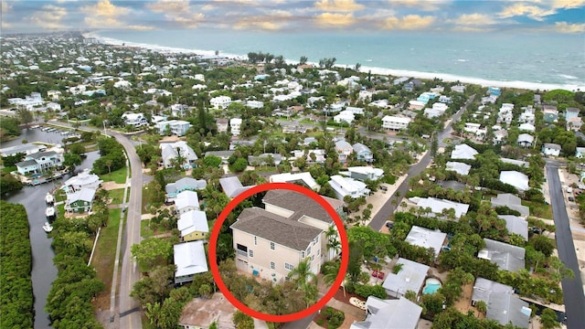 aerial view featuring a beach view and a water view