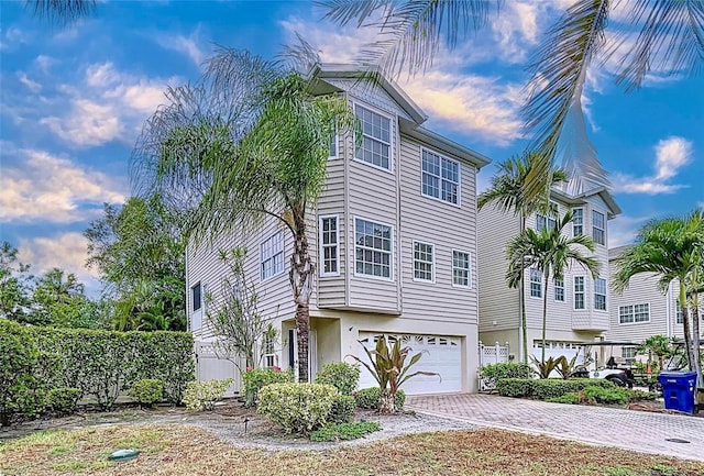 view of front of property with a garage