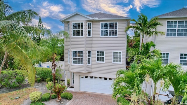 view of front of property with a garage