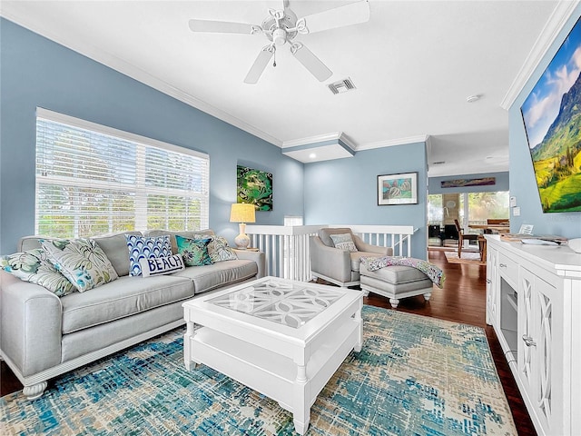 living room featuring ornamental molding, ceiling fan, and dark hardwood / wood-style flooring