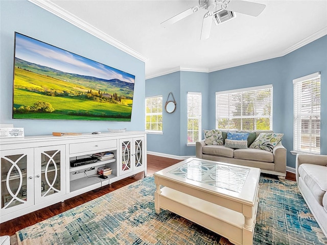 living room with crown molding, ceiling fan, and dark hardwood / wood-style floors