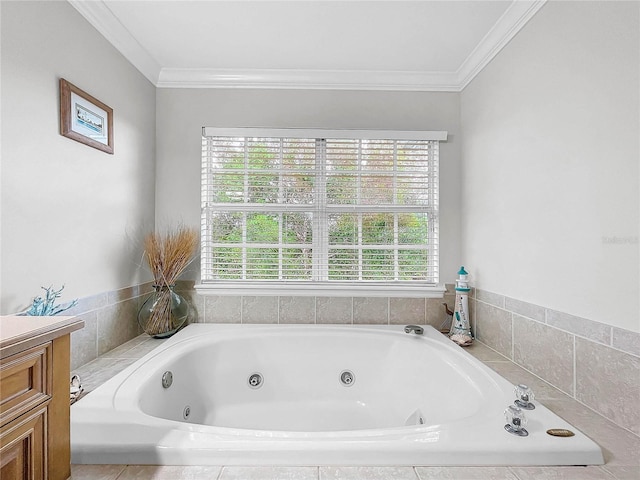 bathroom featuring ornamental molding and a bathing tub