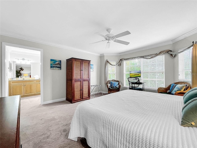 carpeted bedroom with connected bathroom, ornamental molding, and ceiling fan