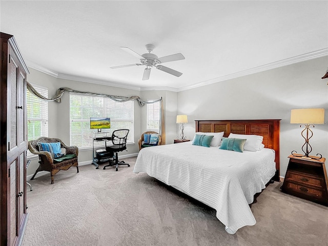 bedroom featuring ceiling fan, ornamental molding, and carpet flooring