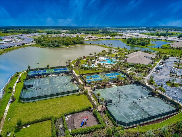 bird's eye view with a water view