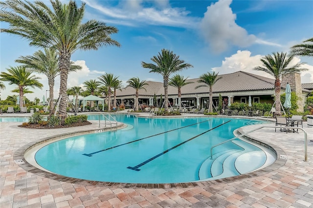 view of pool featuring a patio