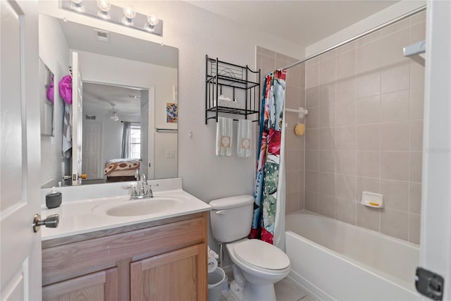 full bathroom featuring oversized vanity, toilet, and shower / bath combo