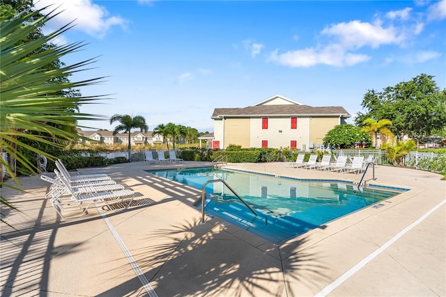 view of swimming pool featuring a patio