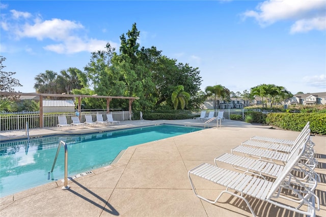 view of swimming pool featuring a patio