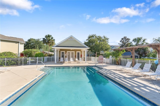 view of swimming pool featuring a patio