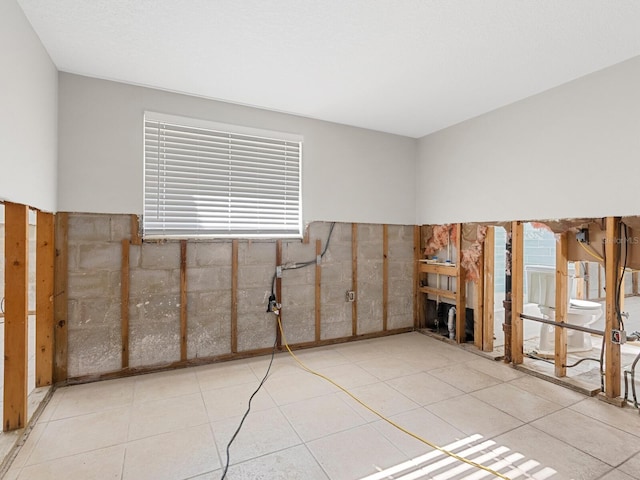 tiled empty room with tile walls