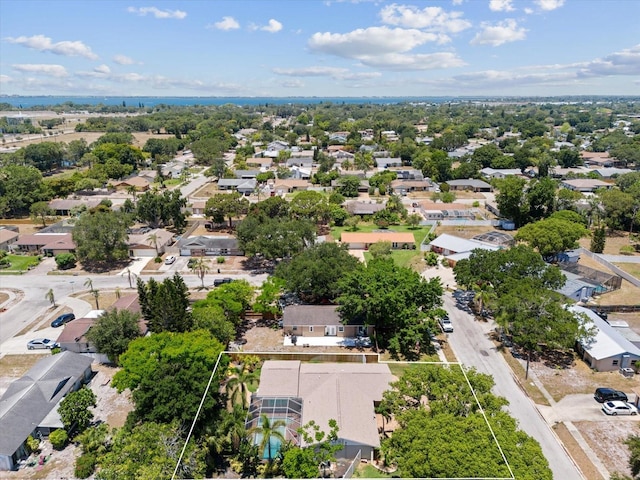 birds eye view of property with a residential view