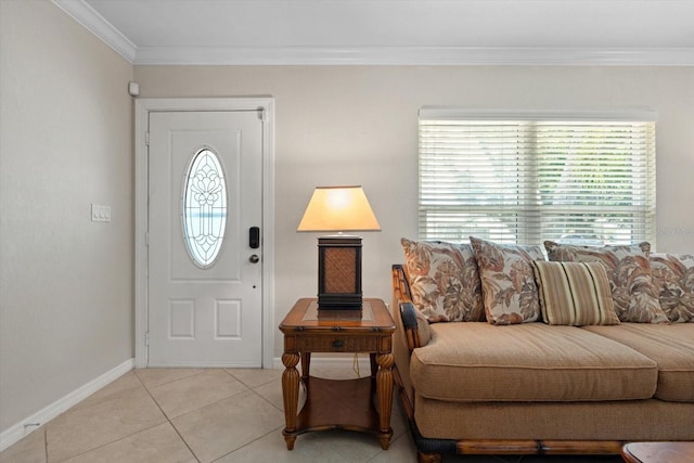 foyer entrance featuring baseboards, ornamental molding, and light tile patterned flooring