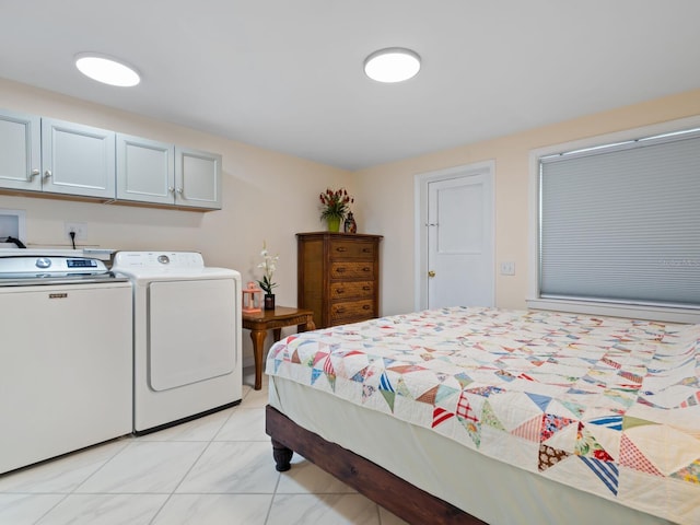 bedroom featuring washer and clothes dryer