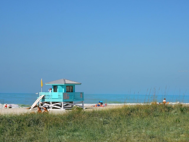 property view of water with a beach view