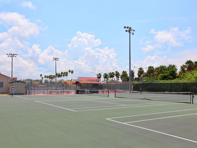 view of sport court with basketball hoop