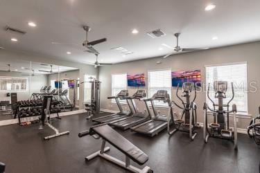 gym with recessed lighting, visible vents, baseboards, and ceiling fan
