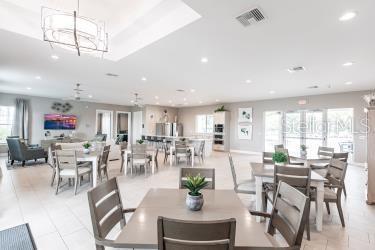 dining area featuring visible vents, recessed lighting, and a notable chandelier
