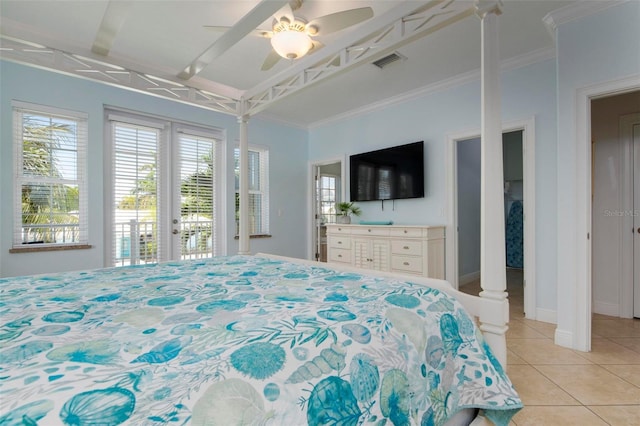 unfurnished bedroom featuring ceiling fan, ensuite bathroom, access to exterior, light tile patterned floors, and french doors