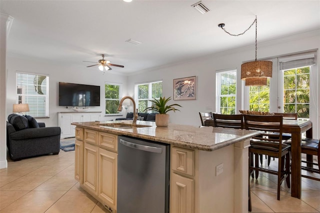 kitchen featuring a sink, crown molding, visible vents, and stainless steel dishwasher