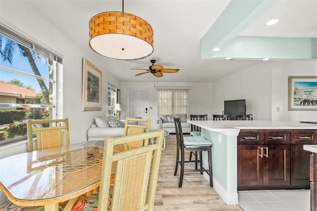 dining room featuring ceiling fan