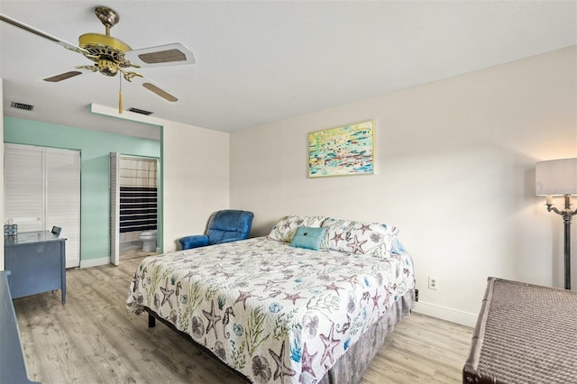 bedroom with ceiling fan and light wood-type flooring