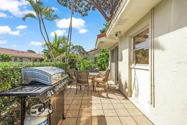 view of patio featuring a grill